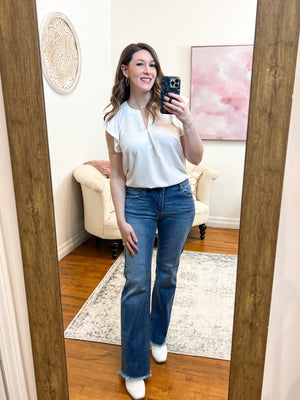Taylor Mid-Rise Bootcut Risen Jeans