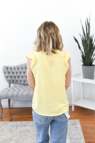 Rosia Ruffle Sleeveless Top