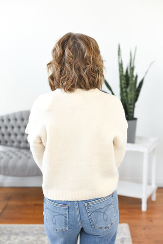 Elsa Lace Up Sleeve Cable Knit Sweater